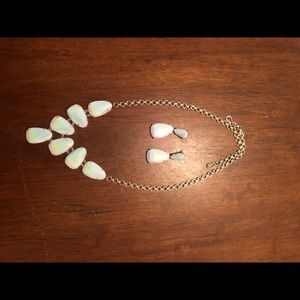 Kendra Scott necklace and earrings.